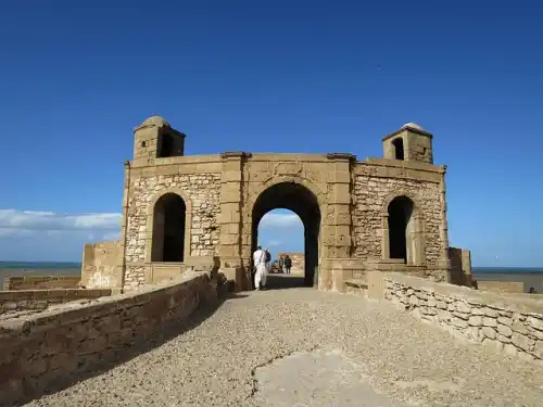 Passeggiata in cammello nel Sahara marocchino al tramonto